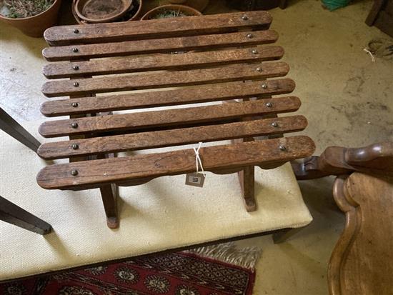 An early 19th century provincial mahogany stool, a fender stool and one other